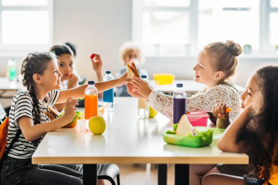 school children eating